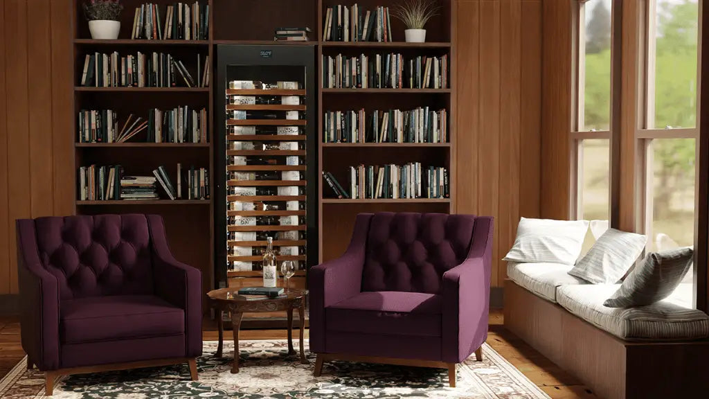 Elegant wine cooler seamlessly integrated into a cozy library with plush seating | Wine Guardian Dealer