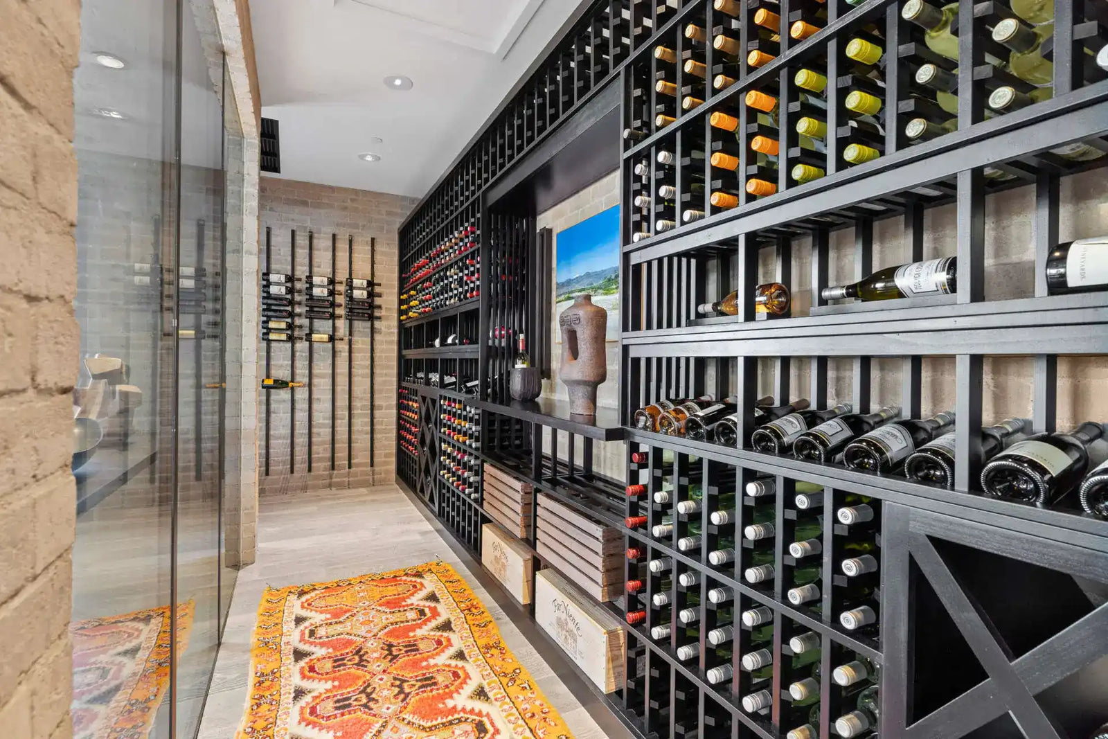 Custom wine rack storage system with metal framework holding multiple bottles.